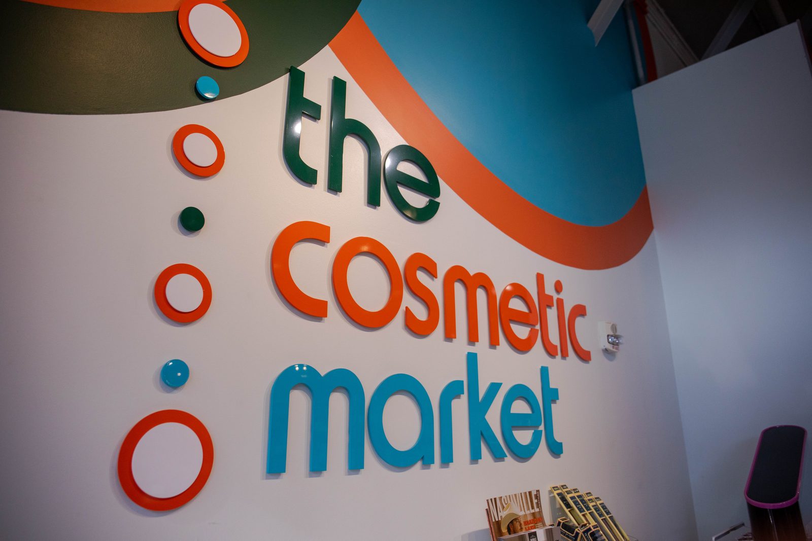 The Cosmetic Market · The wordmark wall