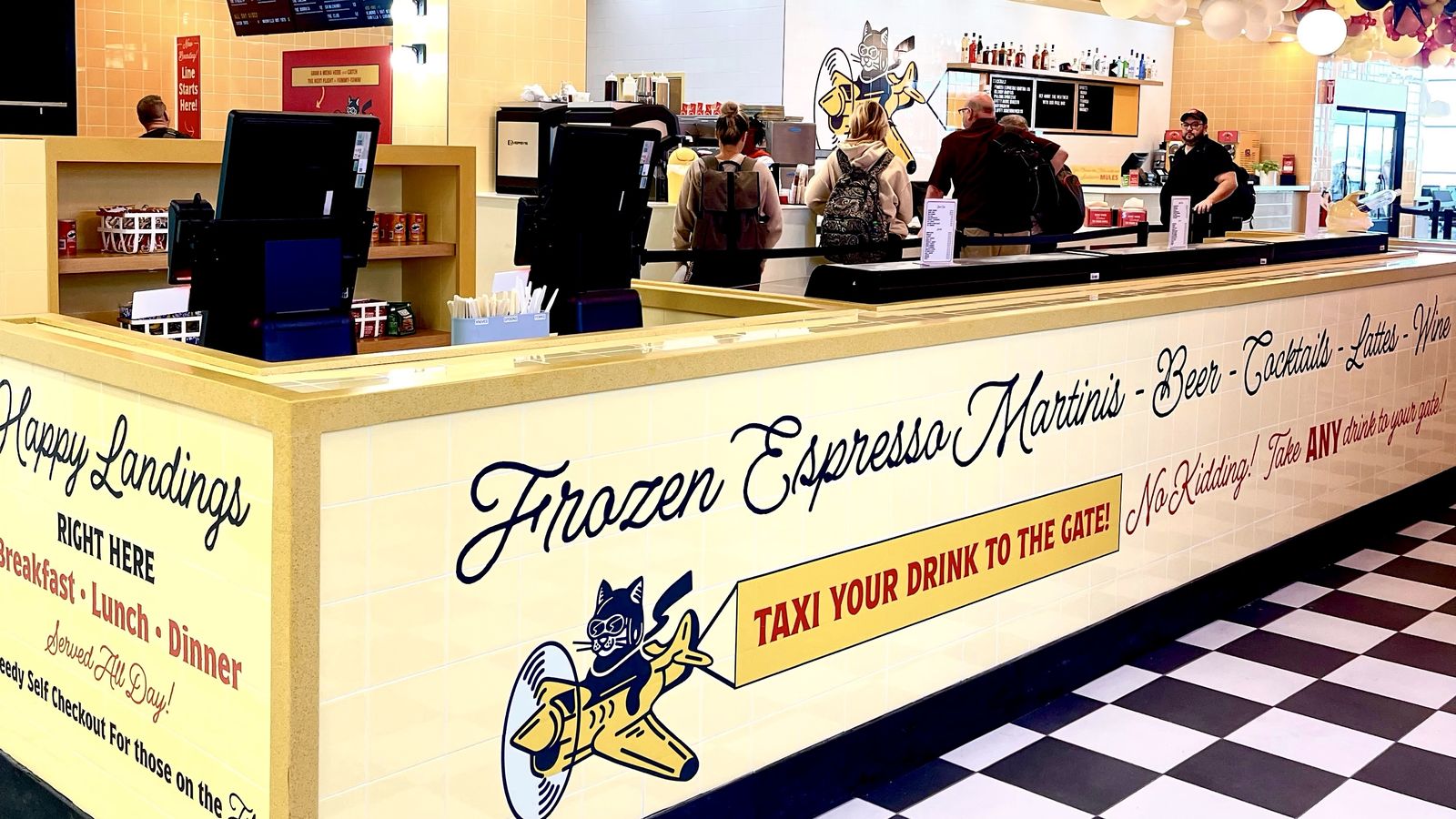 The Kitty Hawk counter at Nashville International Airport, branded by Social Link